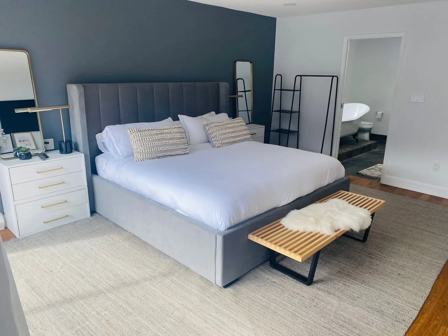 Bedroom 1 with king bed and ensuite clawfoot tub