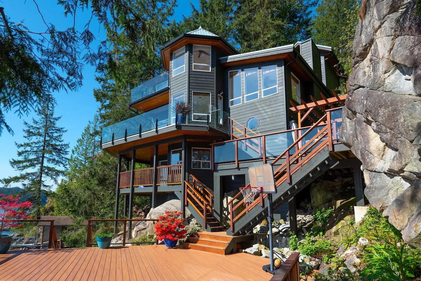 The house and decks seen from the lower patio