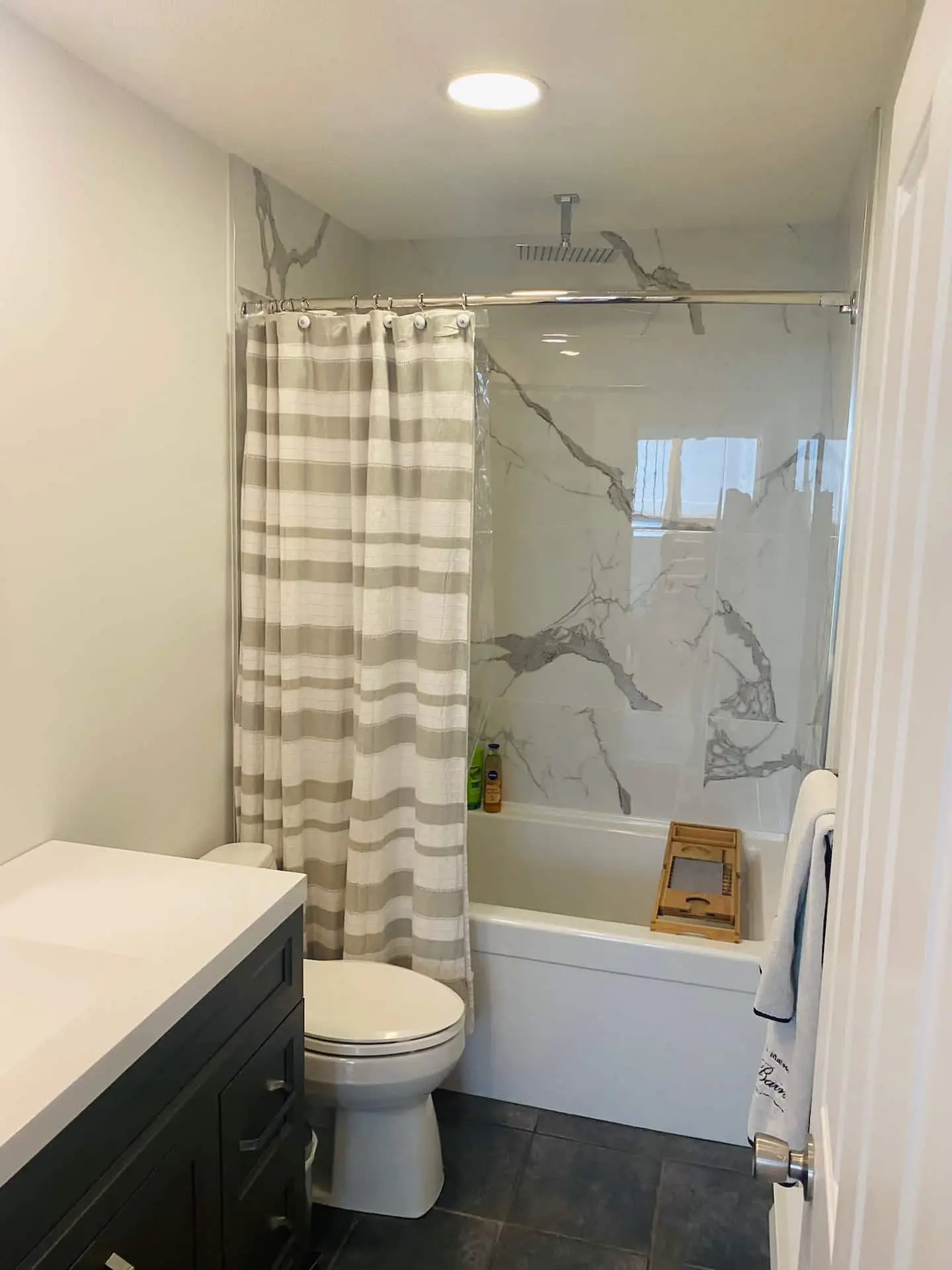 Bathroom with tub and shower